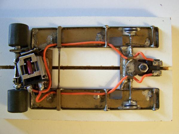 1105
Second build using 0.010 brass sheet backed with 0.047 wire; the H on the 1104 was cut out on this chassis; anglewinder drive.
