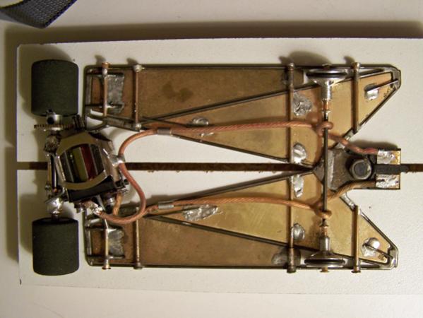 1202
All-wire frame (minimal) with suspended brass plates and pans; anglewinder drive.