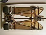 1202 
All-wire frame (minimal) with suspended brass plates and pans; anglewinder drive.
