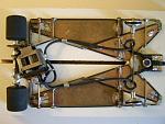 1203 
All-wire frame (minimal) with suspended brass plates and pans; anglewinder drive.