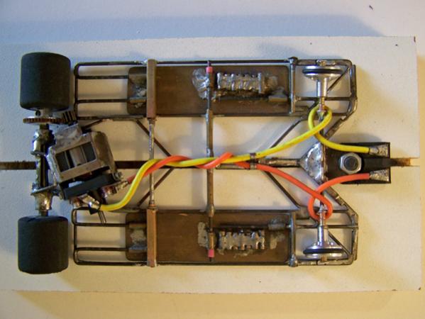 1204
All-wire frame with suspended brass pans; side pans can be adjusted front-to-rear to tune balance; anglewinder drive.