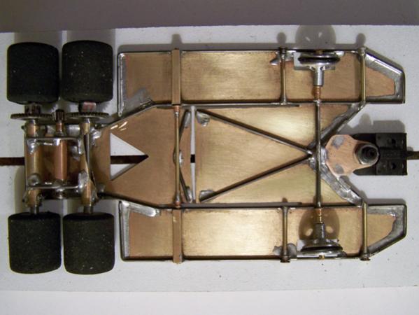 1106
An 1104-style chassis (0.010 brass sheet backed with 0.047 wire), anglewinder with two rear drive axles.