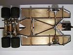 1106 
An 1104-style chassis (0.010 brass sheet backed with 0.047 wire), anglewinder with two rear drive axles.