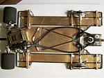 2104 
1/32nd scale chassis to fit under the wide C-100 body; 0.010 sheet brass backed with 0.047 wire (1104-style); anglewinder drive.