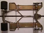 2205 
1/32nd scale chassis to fit under the wide Kremer and C-100 bodies all-wire frame (1205-style) with suspended brass pans; anglewinder drive.