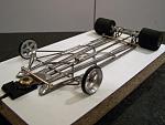 A203 
No-rules in-line open-wheel chassis, all-wire iso-fulcrum chassis with 26D motor.