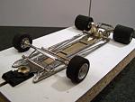 A302(F) 
Ret-ro rules in-line open-wheel chassis, using two construction methods (initial hybrid-build technique chassis); all-wire outer frames...