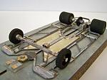 1210-C 
Next chassis design in the 1205/1208&1209 progression; all-wire frame with torsional wire side pans, and two suspended brass pans adjacent...