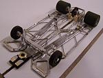 1225-C 
Ret-ro rules in-line, all-wire frame (no brass pans); with damper main rails; separate torsional center-guide section attached to motor box...